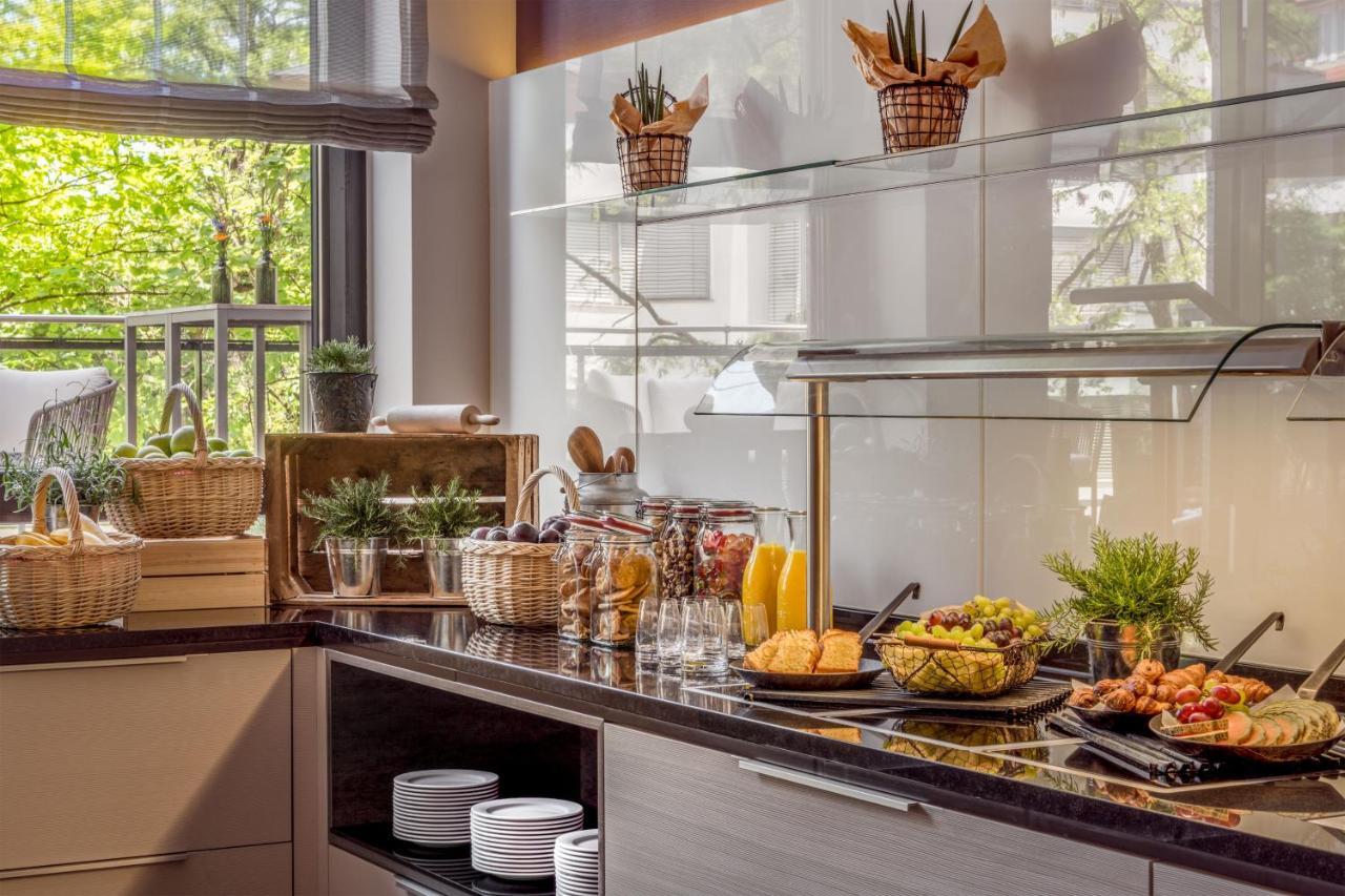 Отель Sheraton Muenchen Westpark Hotel  Экстерьер фото